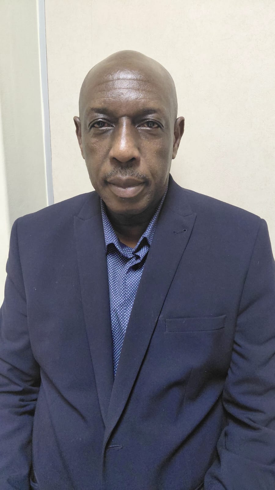 Mr. 
Mokoni Elmon